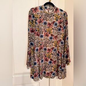 70’s inspired floral dress with long bell sleeves